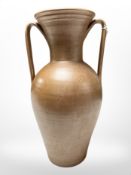 A salt glazed twin-handled amphora urn,