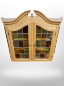 A Danish blond oak and leaded glass double door cabinet,