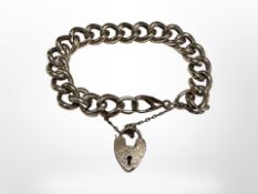 A Gent's 15ct rolled gold curb bracelet with padlock