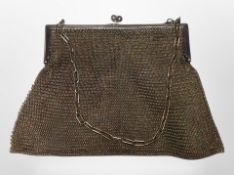 A silver plated mesh purse