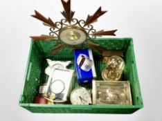 A crate of teak and brass sunburst clock, various mantel clocks,