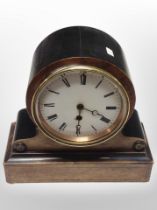 A Victorian mantel clock with enamel dial,