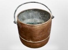 A 19th century copper swing handled cooking pot,
