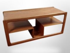 A Mcintosh teak coffee table with undershelves,