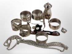 A group of costume jewellery, napkin rings,