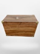 A hardwood brass mounted blanket box,