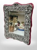 An ornate silvered Art Nouveau style easel mirror,