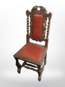 A 19th century Danish carved oak barley twist hall chair with studded leather seat