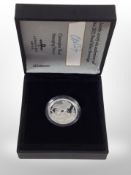 A silver proof coin
