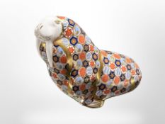 A Royal Crown Derby Imari Walrus paperweight, silver stopper.