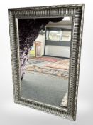 A silvered overmantel mirror,