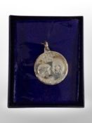 A Charles and Diana silver medallion