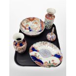 A group of Japanese Imari porcelain vases and bowls