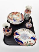 A group of Japanese Imari porcelain vases and bowls