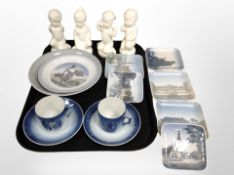 A group of four Danish porcelain figures of babies, Royal Copenhagen tea cups and saucers,