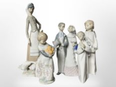 A Lladro figure of a Bride and Groom, further Lladro figure of a lady with Geese,
