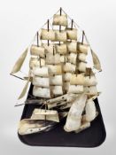 Five Scottish polished horn models of ships,