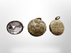 Two Victorian gilt lockets and a further brooch