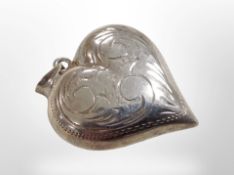 A silver heart pendant