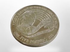 A silver £5 coin
