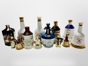 A collection of alcohol decanters, Bells, Lambs Navy rum,
