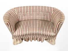 An early 20th century Continental two seater salon settee in classical upholstery,