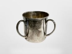 A small silver loving cup