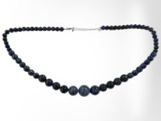 A graduated lapis lazuli necklace, length 45 cm.