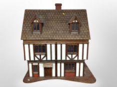 A Tudor style doll's house,