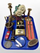 A painted cast iron door stop together with various candlesticks, pestle and mortar,