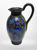 A Dutch Gouda pottery ewer,