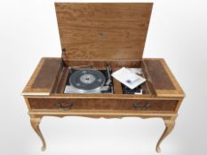 A Dynatron record player in cabinet, with Garrard Mk IV turntable,