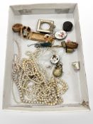 A box of various trinkets, shoe pin cushion, small mother of pearl frame,
