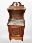 A late Victorian carved walnut and marble topped coal receiver,
