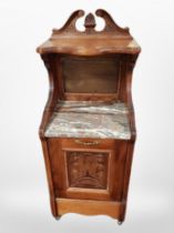 A late Victorian carved walnut and marble topped coal receiver,