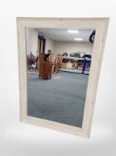 A contemporary oak framed overmantel mirror,