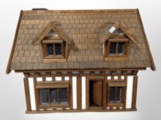 A Tudor style doll's house,