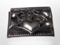 An Arts and Crafts cast metal stamp box,