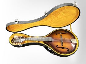 An Ibanez mandolin in hard case CONDITION REPORT: UK Shipping £25 + vat.