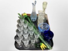 A group of Scandinavian glass wares, several coloured glass flowers, drinking glasses,