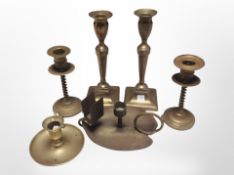 Two pairs of brass candlesticks and two chamber sticks