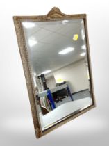 A gilt gesso bevelled easel mirror,