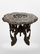A 19th century Thai finely carved hardwood occasional table,