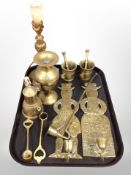 A group of brass ware, pair of figural candle wall sconces, pestles and mortars, vase,
