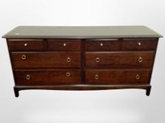 A Stag Minstrel eight drawer low sideboard,