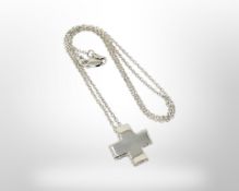 An 18ct white gold diamond set cross pendant on chain CONDITION REPORT: 4.