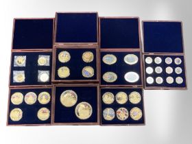 A good collection of commemorative gold plated pictorial coins to include The Pillars of our