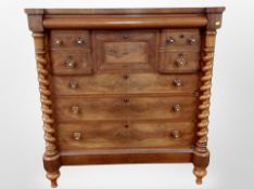 A Victorian mahogany Scotch chest with barley twist column supports,