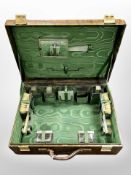 An American crocodile leather travel case by J W Robinson and Co of Los Angeles,