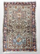 A small Iranian hearth rug, 80cm x 53cm.